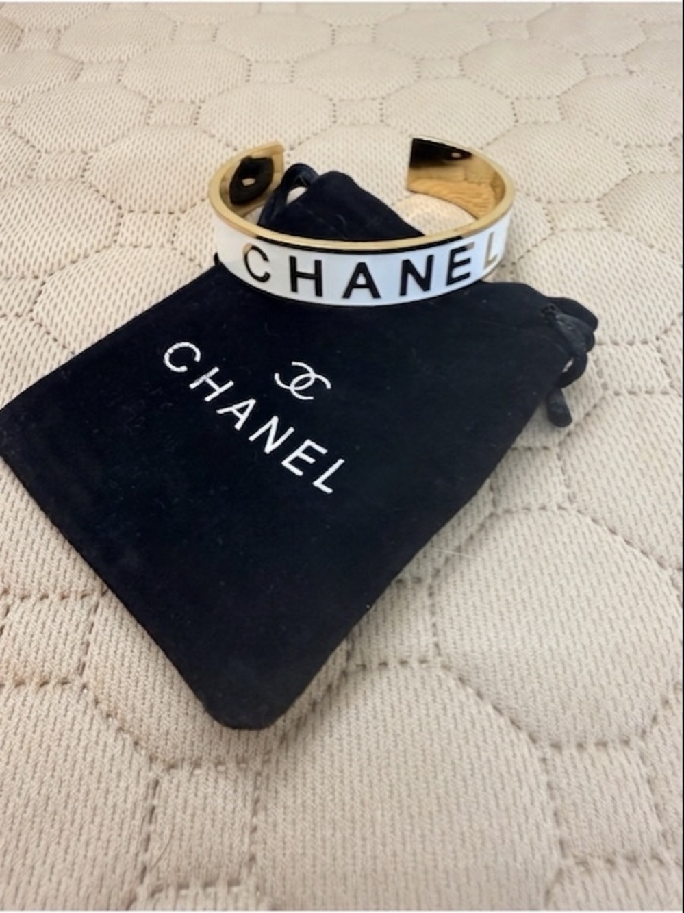 CHANEL EUC White Enamel 
Logo Cuff Bracelet Gold Tone 
Made in France  One Size